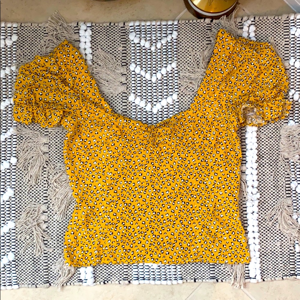Yellow animal print top (princes sleeves)
